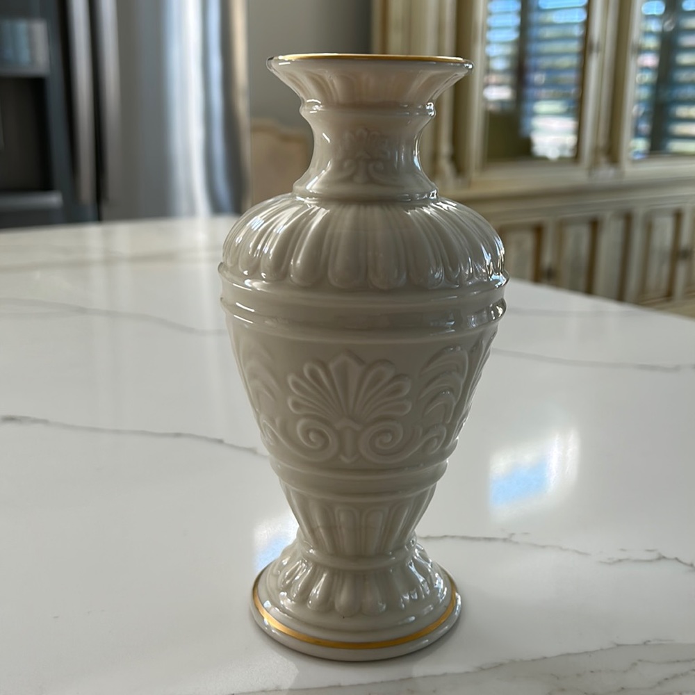 Lenox cream color vase with gold trim.